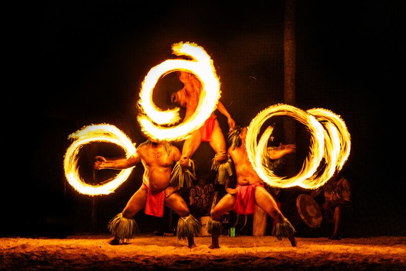 fire dancers at a luau party