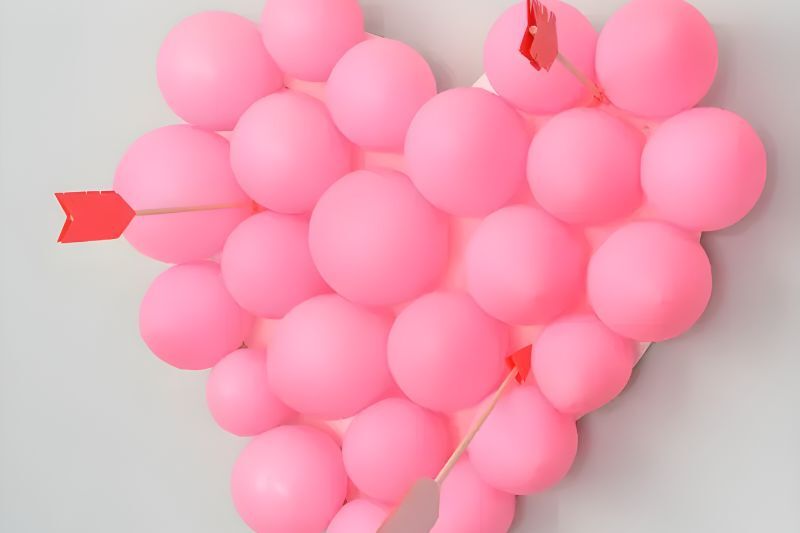Valentine's Day party ideas for kids - Cupid's arrow balloon pop