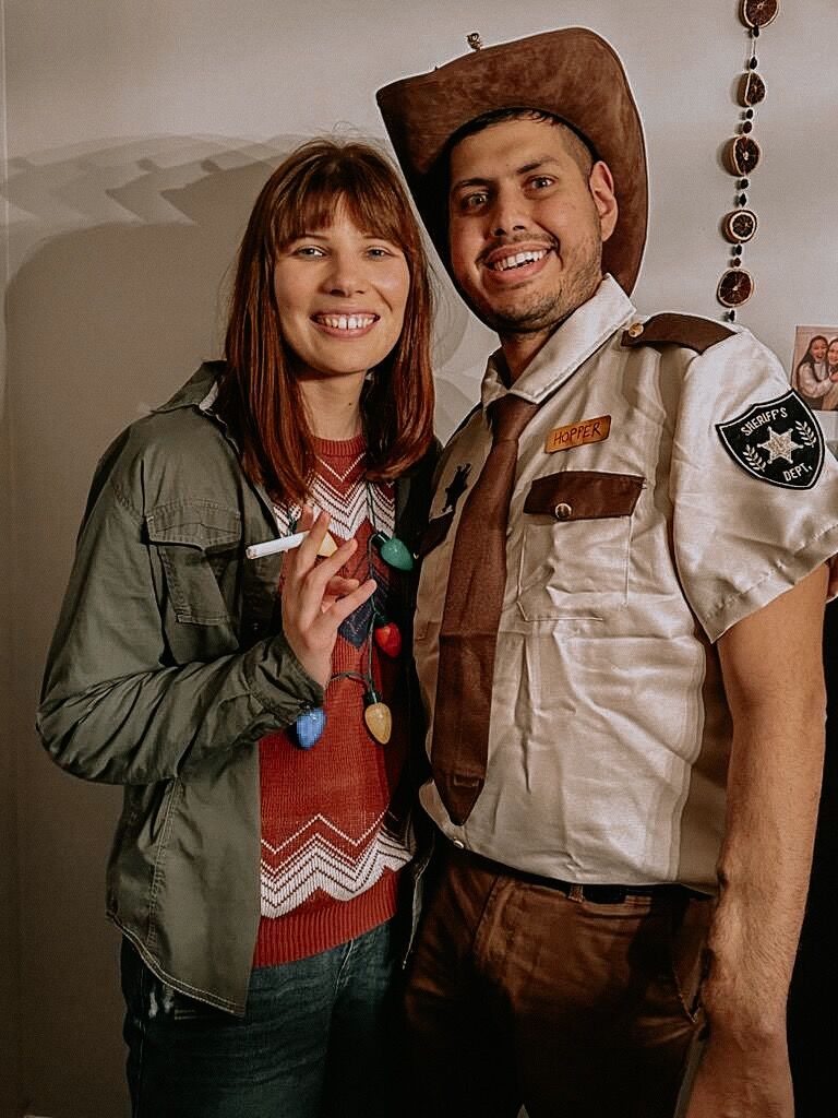 After avoiding the show for years because it was "too popular," Fernando finally gave into Kati pressuring him to watch Stranger Things...and loved it. He liked it so much, he agreed to go with her as Joyce and Hopper for her Aunt Sue's Halloween party ;)