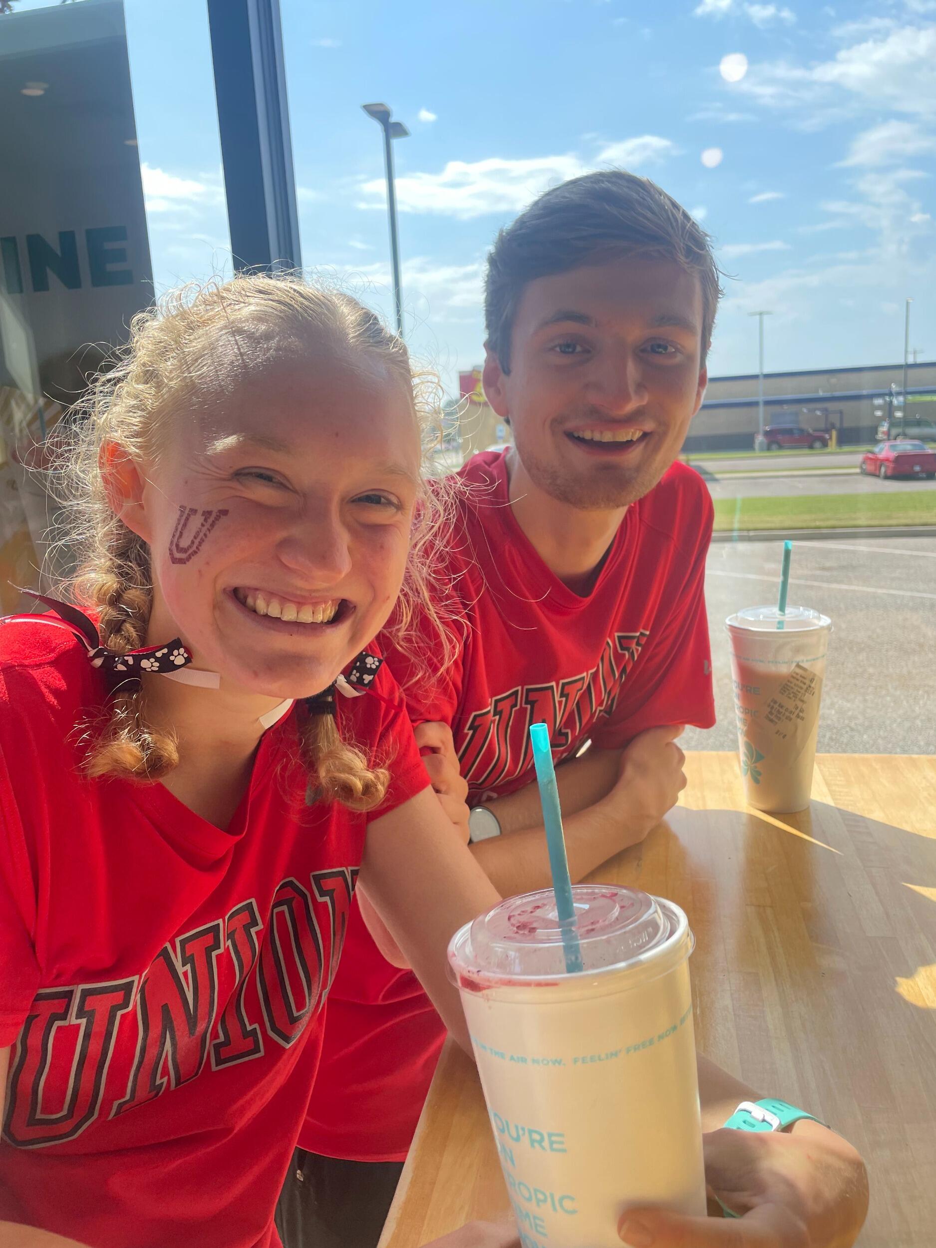 Ayla and Caleb at Tropical Smoothie after a cross country race (yum)
