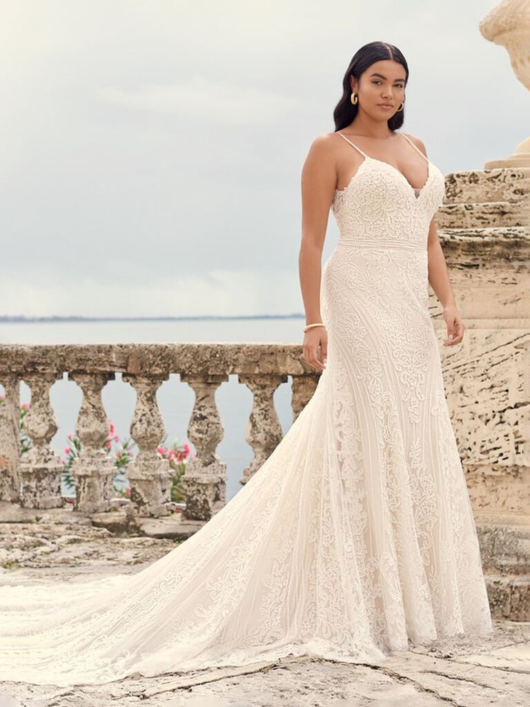 maggie sottero off white sheath wedding dress with sweetheart neckline spaghetti straps deep v-back lace chest and form fitting pleated flowy lace skirt
