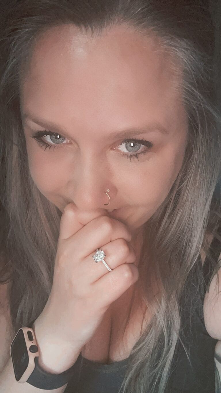 We got engaged! Miki excitedly shows off the ring she picked out.