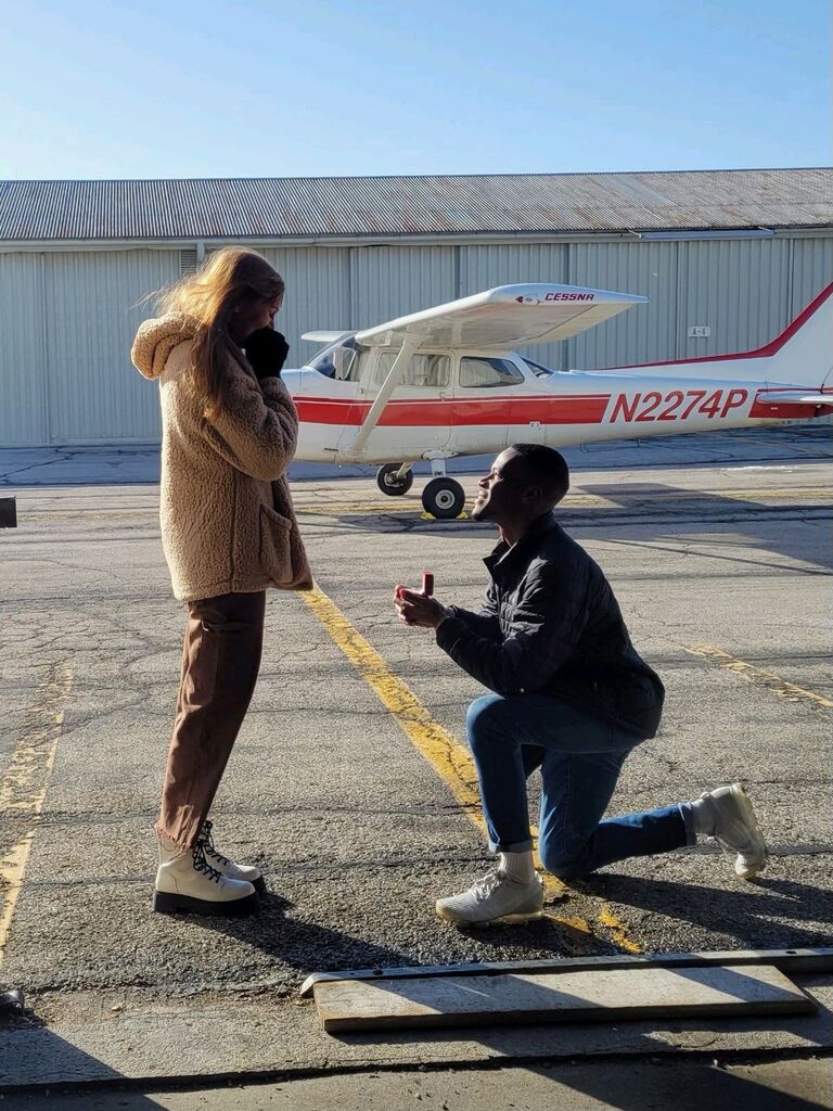 Colby finally got on one knee, after teaching Michaela how to fly a little! It was a long 2 years of waiting for Michaela!