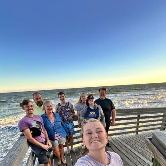 Both of our families on a beach trip to North Topsail. We found a lot of shark teeth!