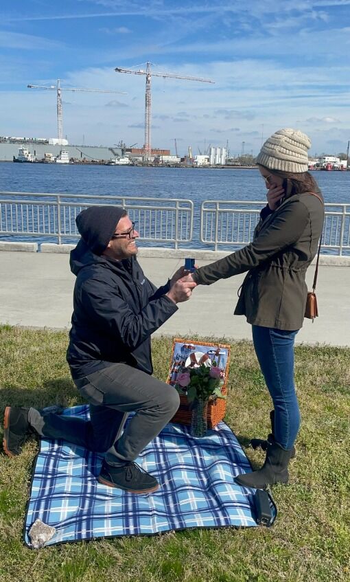 The Proposal (pt2): After spotting the picnic basket set up and hearing her favorite song playing, Dave got down on one knee and asked Meaghan to marry him. After saying a loud "yes!" Meaghan realized that Dave's 14-year-old son, Jayden, had been filming the whole thing and taking pictures so he could help with the surprise. In addition to the kids, Meaghan was then surprised to see her brother (from out of town), sister, and brother-in-law running out and screaming their congratulations.