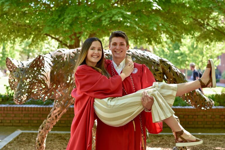 Baleigh and Jack graduate from NC State University together 