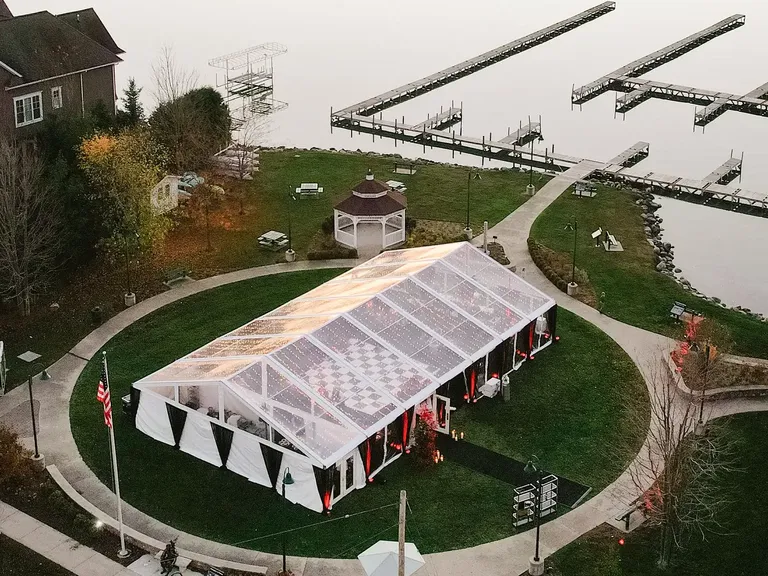 Clear tented outdoor reception at Hotel Walloon in Walloon Lake, Michigan