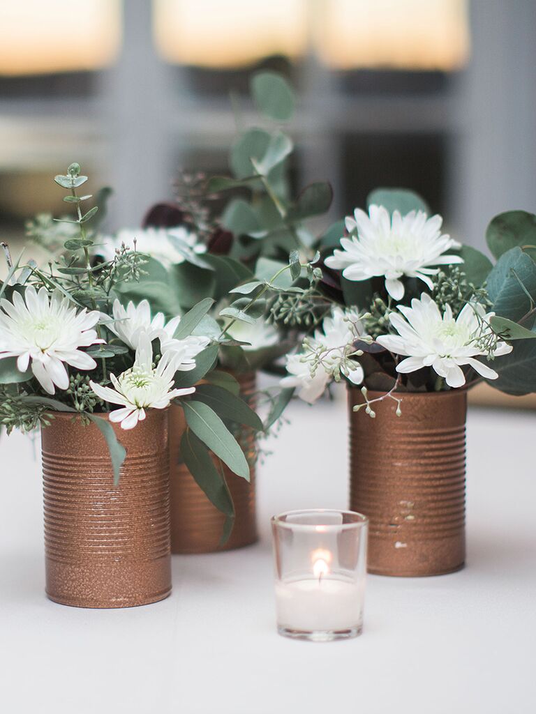Create lush flower arrangements with a few fresh flowers and a lot of greenery