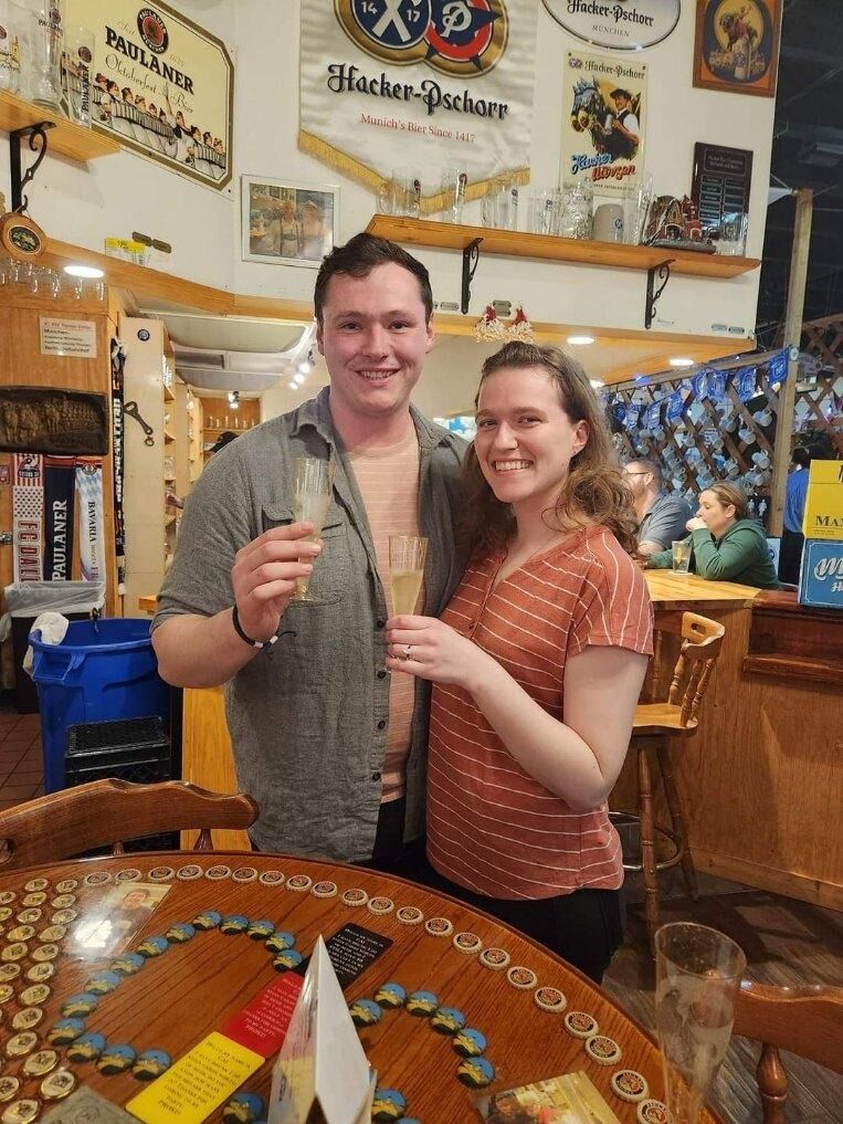 Celebrating our engagement at the Bavarian Grill, after a cross country road trip from Boston!
