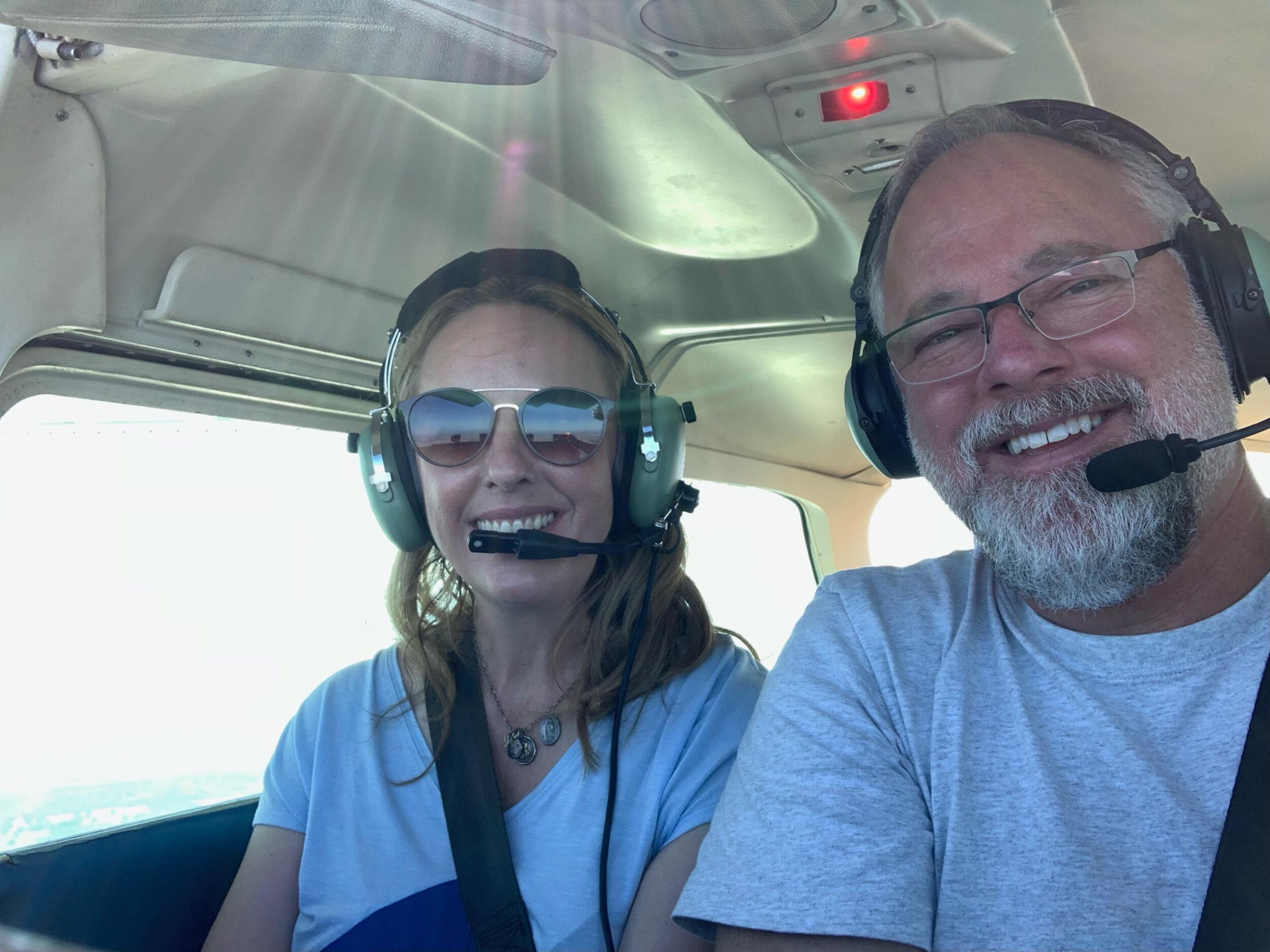 Dave couldn't resist showing off his pilot skills (which clearly worked), so he took me flying in a Cessna at work. He even let me take the controls, and I was hooked!