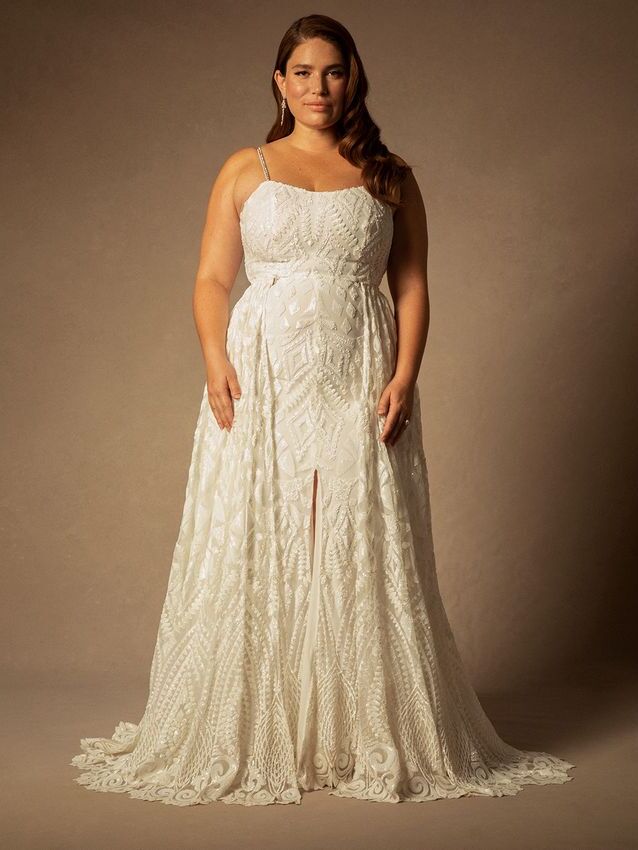 Sparkly plus size wedding dress by ELOQUII. 