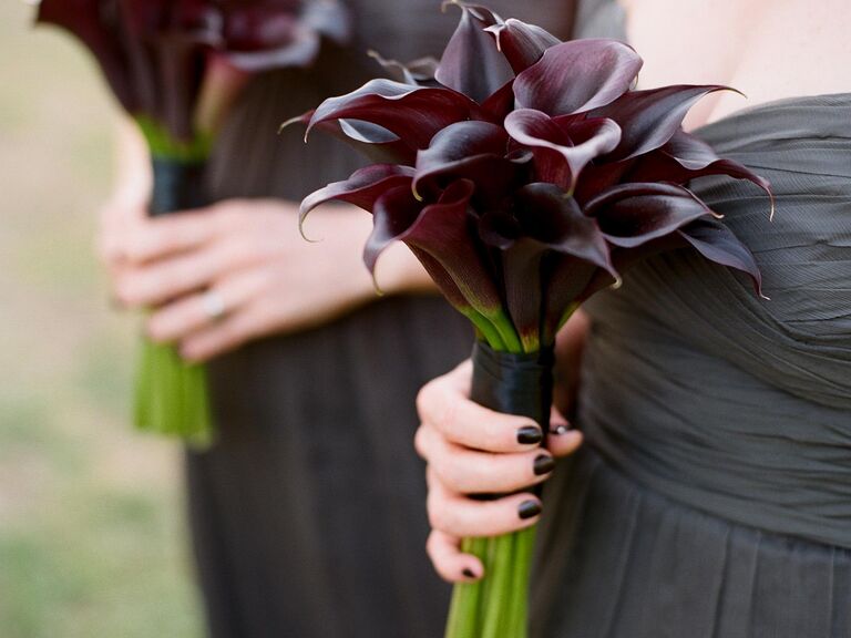 Dark plum colored calla lily bridesmaid bouquet