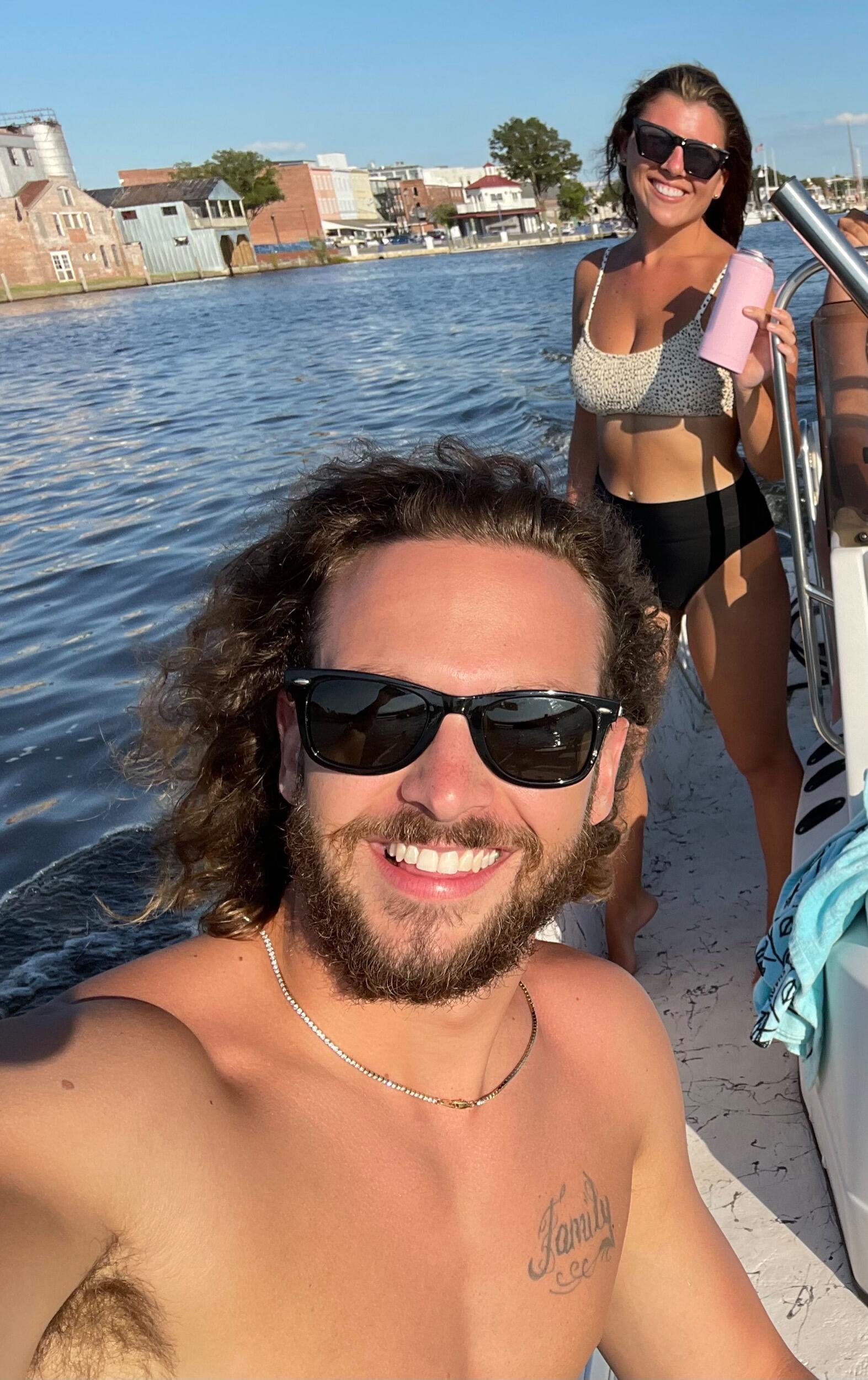 Joel and Lexie first met at a local bar in Greenville, NC. The next day, they were both invited to join a group of mutual friends for a boat day. This was the start of forever!