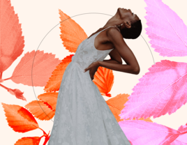 Bride shows off a beautiful white lace gown in front of a colorful botanical background