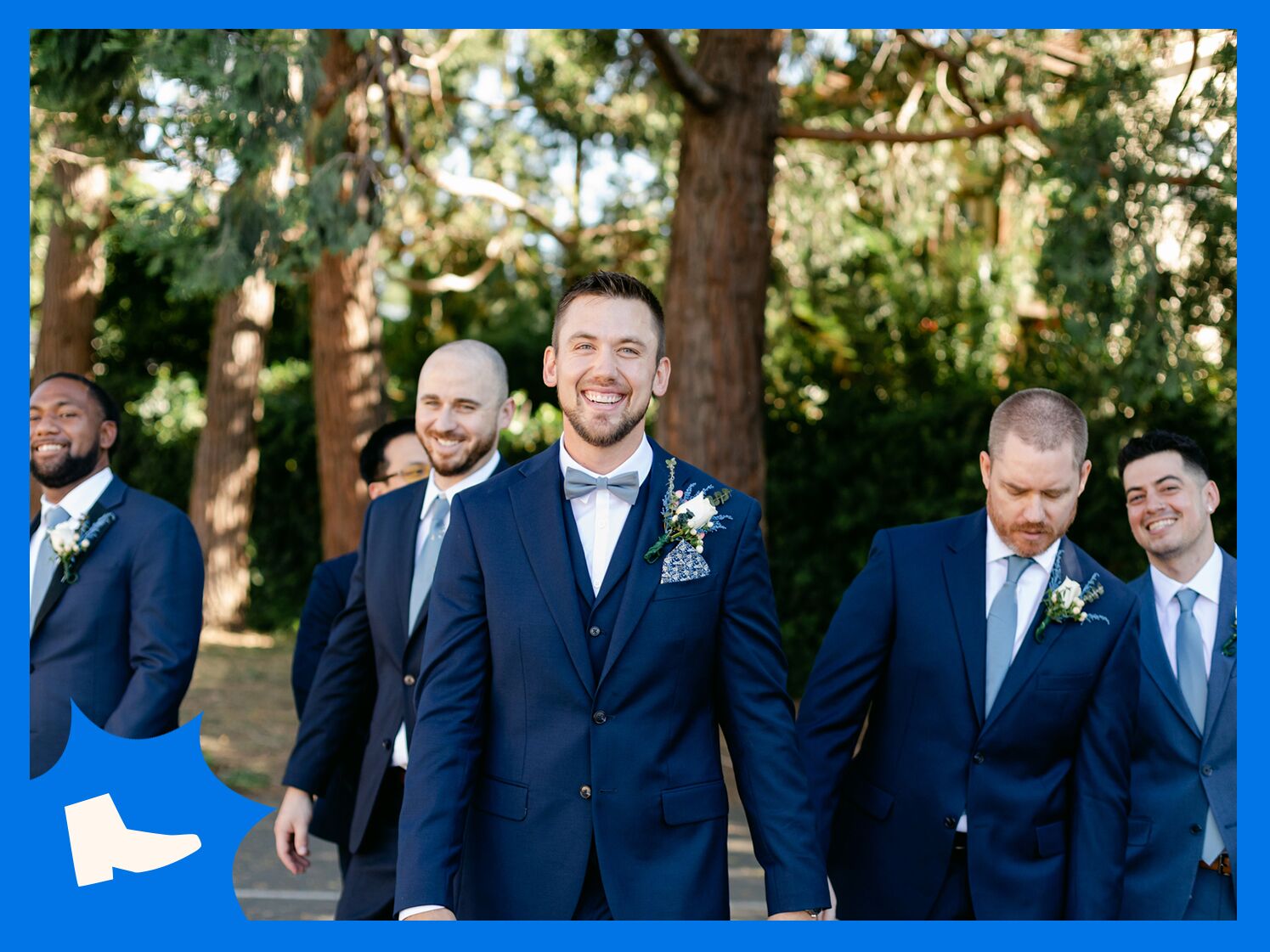 Groom and groomsmen wearing blue ties
