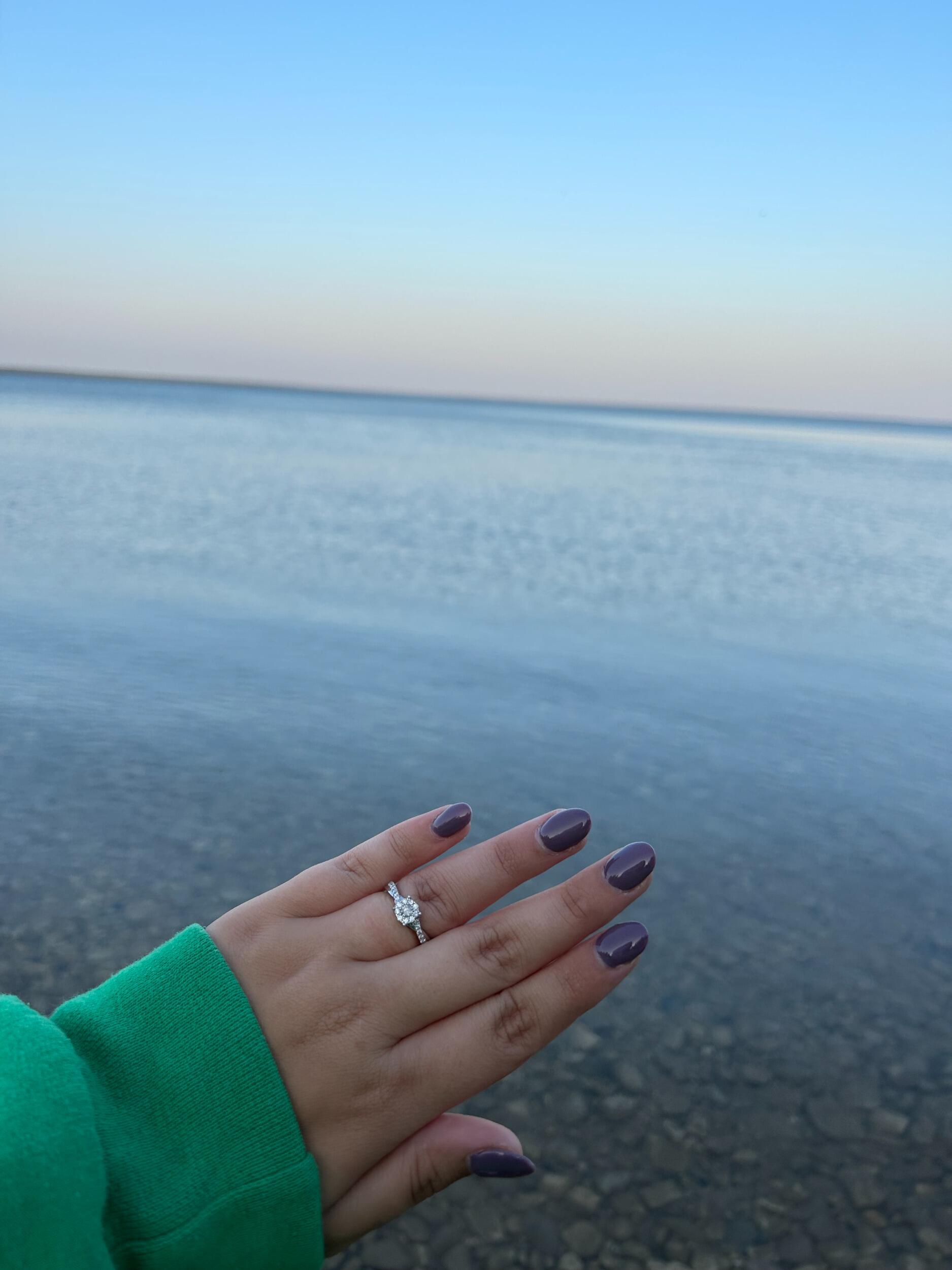 We got engaged! Chris proposed in St. Ignace on Labor Day Weekend at sunset! It was the sweetest surprise even though Emma wouldn't turn around for quite a few minutes! 