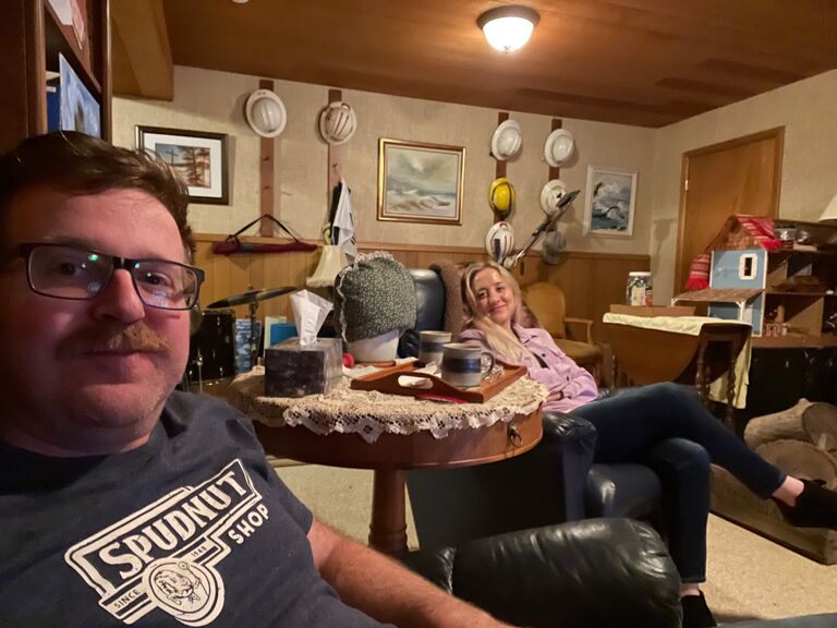 In David’s parents basement watching television & sipping tea of course!