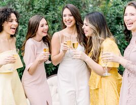 women drinking champagne with bride at bridal shower
