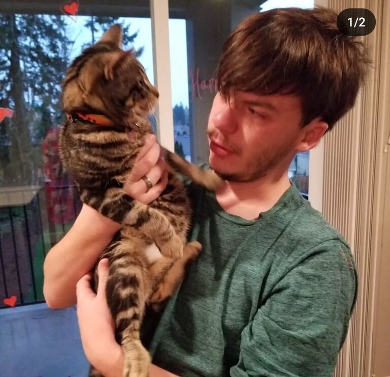 Tanner moved in with me in my first apartment in Tumwater Washington. His first time meeting Tortellini, my first cat I got while living in Olympia. 