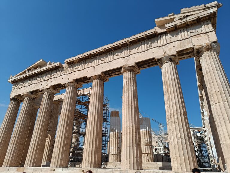Heather's going to a conference in Athens? Sounds like a good excuse for Adam to have a holiday.