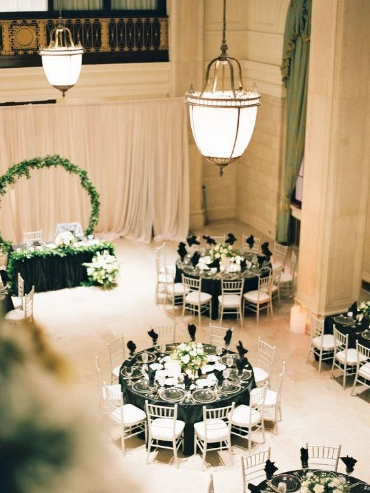 ballroom wedding reception with black-and-white decor