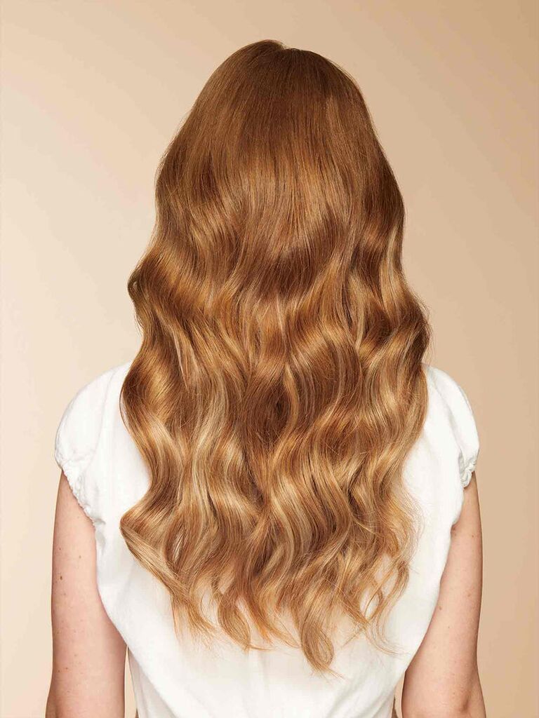Long copper-colored hair extensions. 