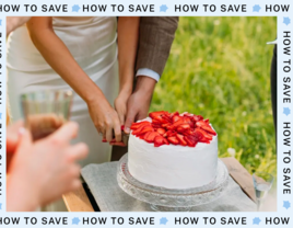 Couple cutting a classic white cake with fresh strawberries