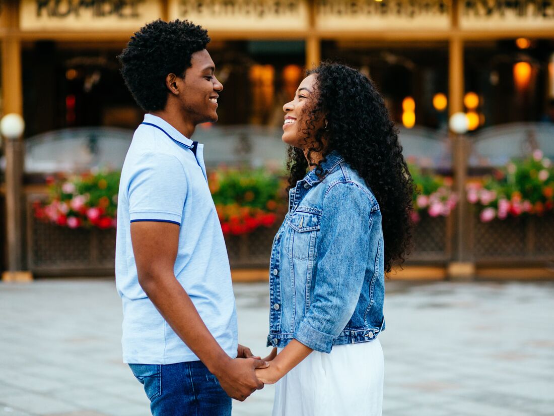 Happy couple holding hands