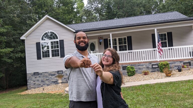 1733 Woodglo Dr Asheboro NC. Our first house! Angie loves the wonderful yard they now have. Justin loves the tall ceilings in the living room. 
