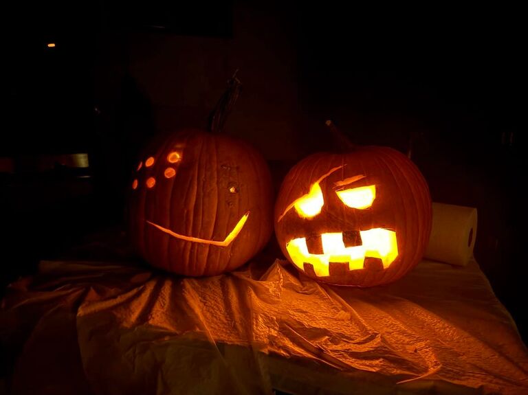 Micaela's (right) first time carving pumpkins