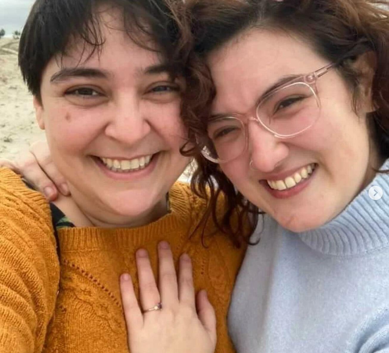 Simone took Ada to Solvang, CA. On their way there, she had them stop at a beach where she asked Ada to marry her. Ada said yes! 