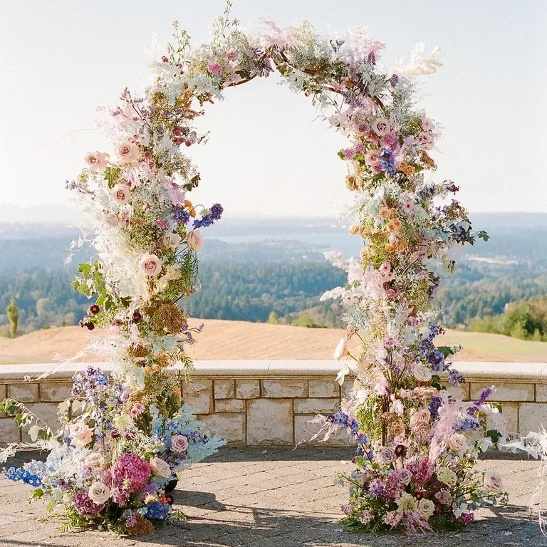 Colorful floral wedding arch, taylor swift themed wedding 
