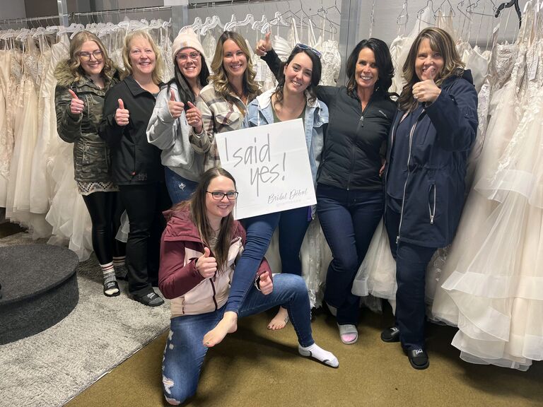 She did it!

With half her wedding party and all 3 Moms, Melyssa found her dream dress!