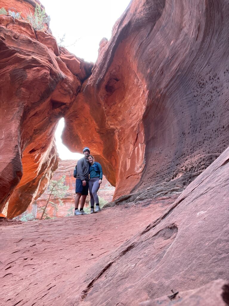 Our trip to Sedona, AZ. We got word there was a hidden cave called "lone tree cave" tucked away in rocks of Boynton Canyon. They say it takes years to find it. We took that as a challenge and we said, "If we find this were meant to be together." Sure enough, after a couple hours and some sketchy paths, we found it and here we are getting married. 