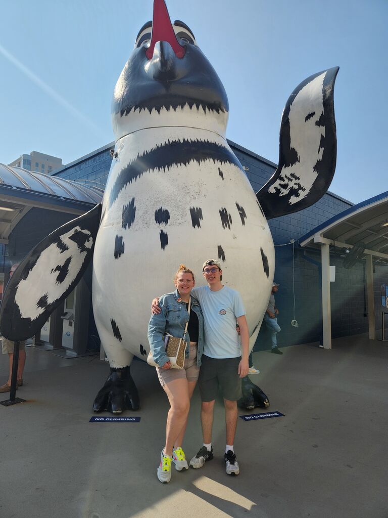 Aiden and Meredith's first vacation together was to Gatlinburg, TN. On the way they stopped at the Atlanta Aquarium and got this cool picture.