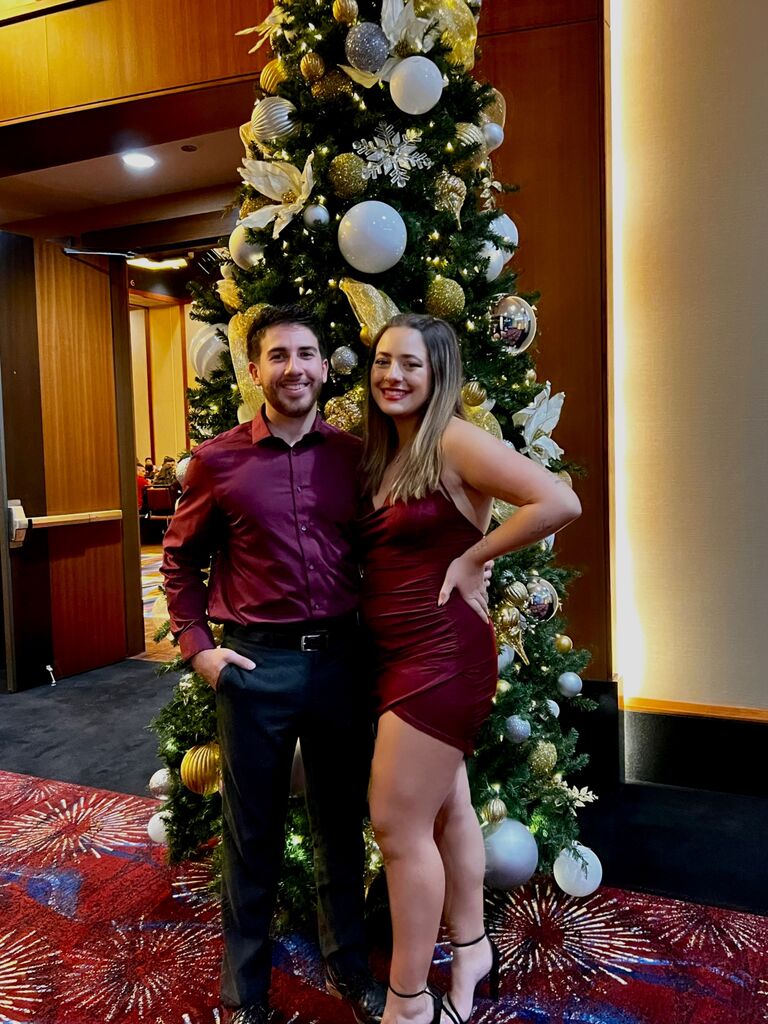 Joshua and Ariel make their first official appearance at Joshua’s work Christmas party. 