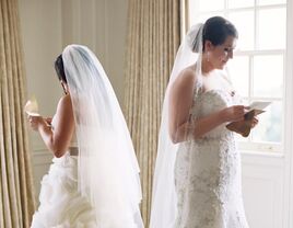 brides reading wedding day letters