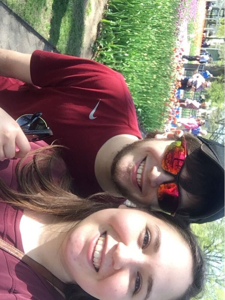 Our first time visiting Holland together. It's not a great photo, but it's the only one we took. About 1 years 5 months. 