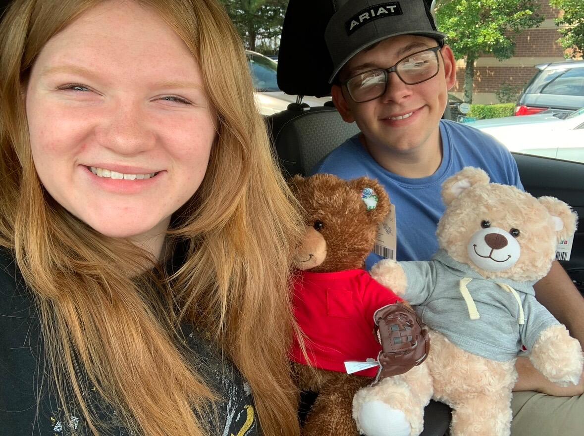 Preparing to go to school! Soon to be 125 miles apart, we went to build-a-bear to take some friends with us!