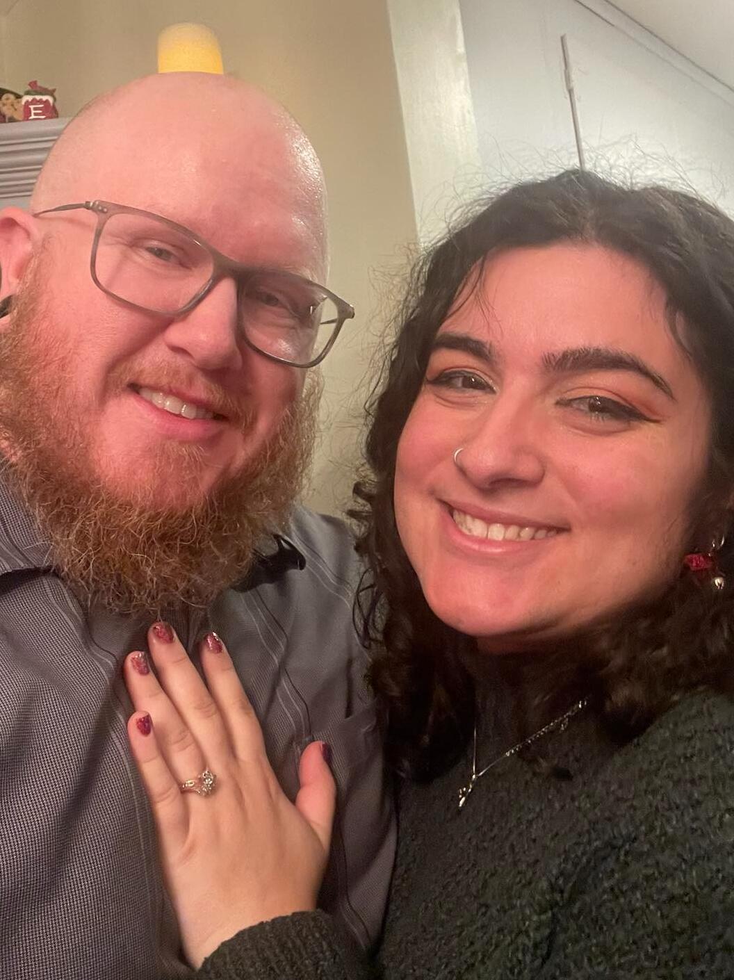 Patrick proposed on Christmas Eve with the help from a hand written note from Sherman and a Spotify scan code. Angela said yes in the company of family.