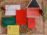 colorful red, yellow and green invitation suite