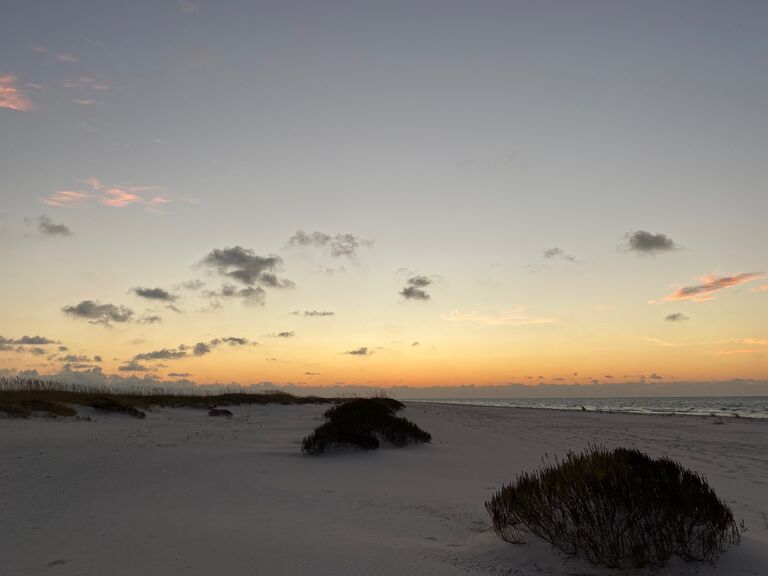 Mindy and Connor camp on the beach at Fort Pickens and decide camping on the beach is not for them. The sunrise was worth it though!