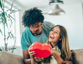 Husband giving wife gift