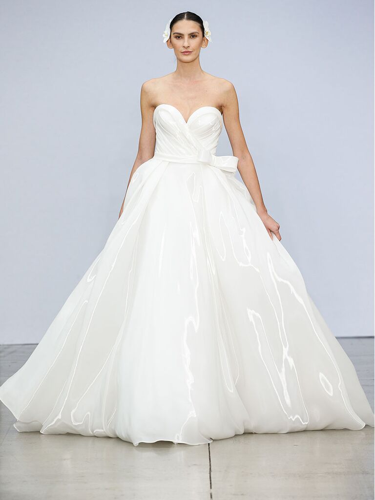 plunging pleated satin ball gown with bow