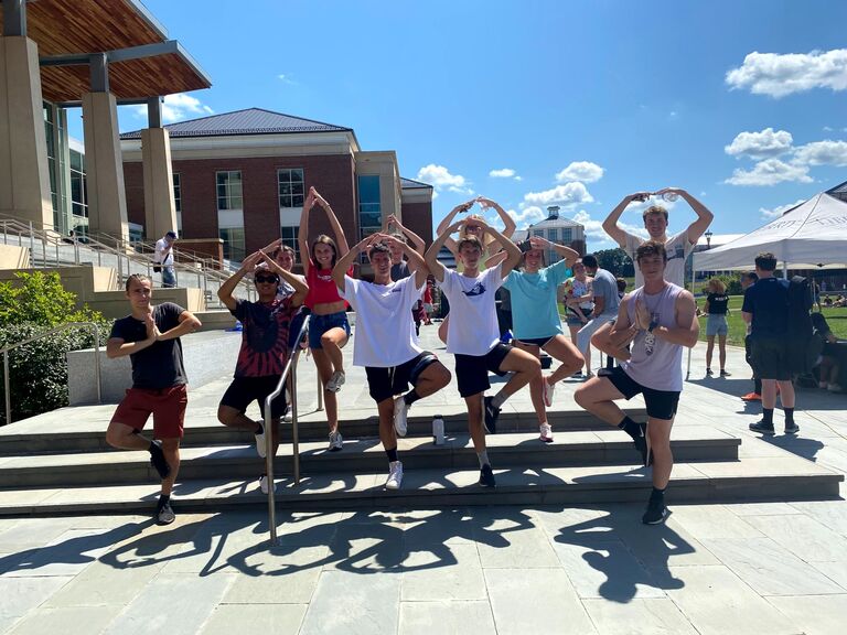 On the Saturday before the first day of classes freshman year, we met on a bro/sis scavenger hunt at "the hill". 