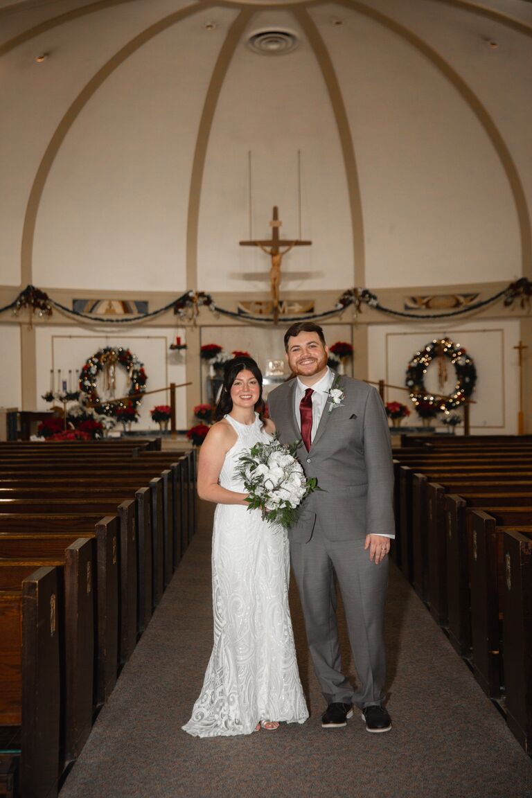 Dylan and Mariana have a small ceremony with their immediate families at St. Joseph's Church in Malden, MA