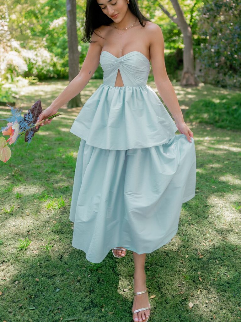 Light blue tiered maxi wedding guest dress with cutout detail on bodice