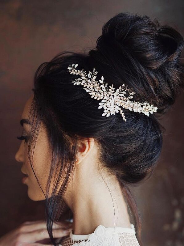 High bun with sparkling accessory wedding updo for long hair