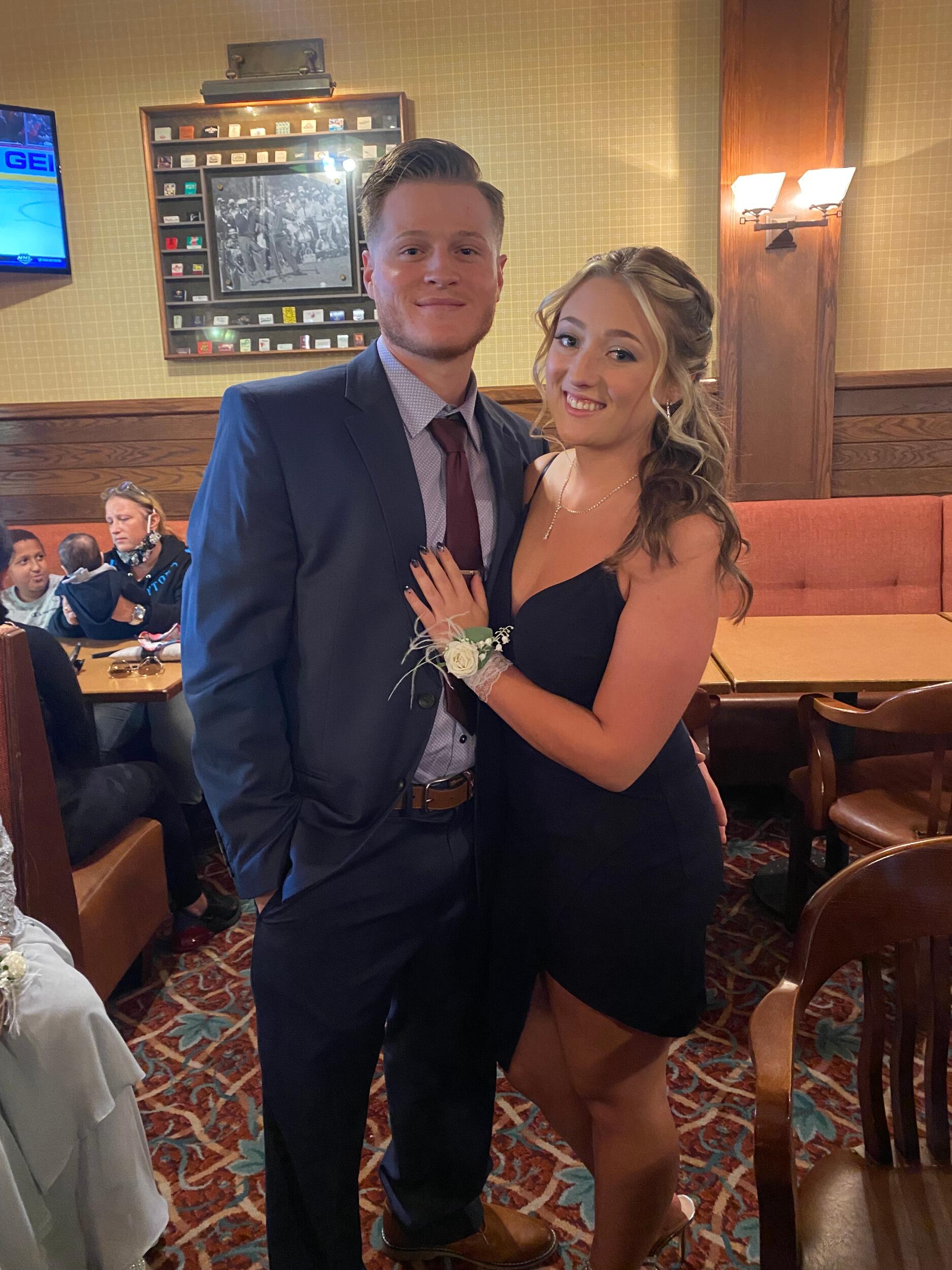 Celebrating my brother's wedding where I caught the bouquet! (That was Ryan's hint). 