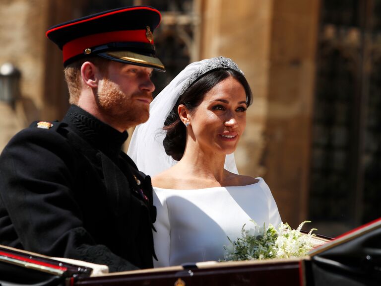 Prince Harry and Meghan Markle in carriage on wedding day